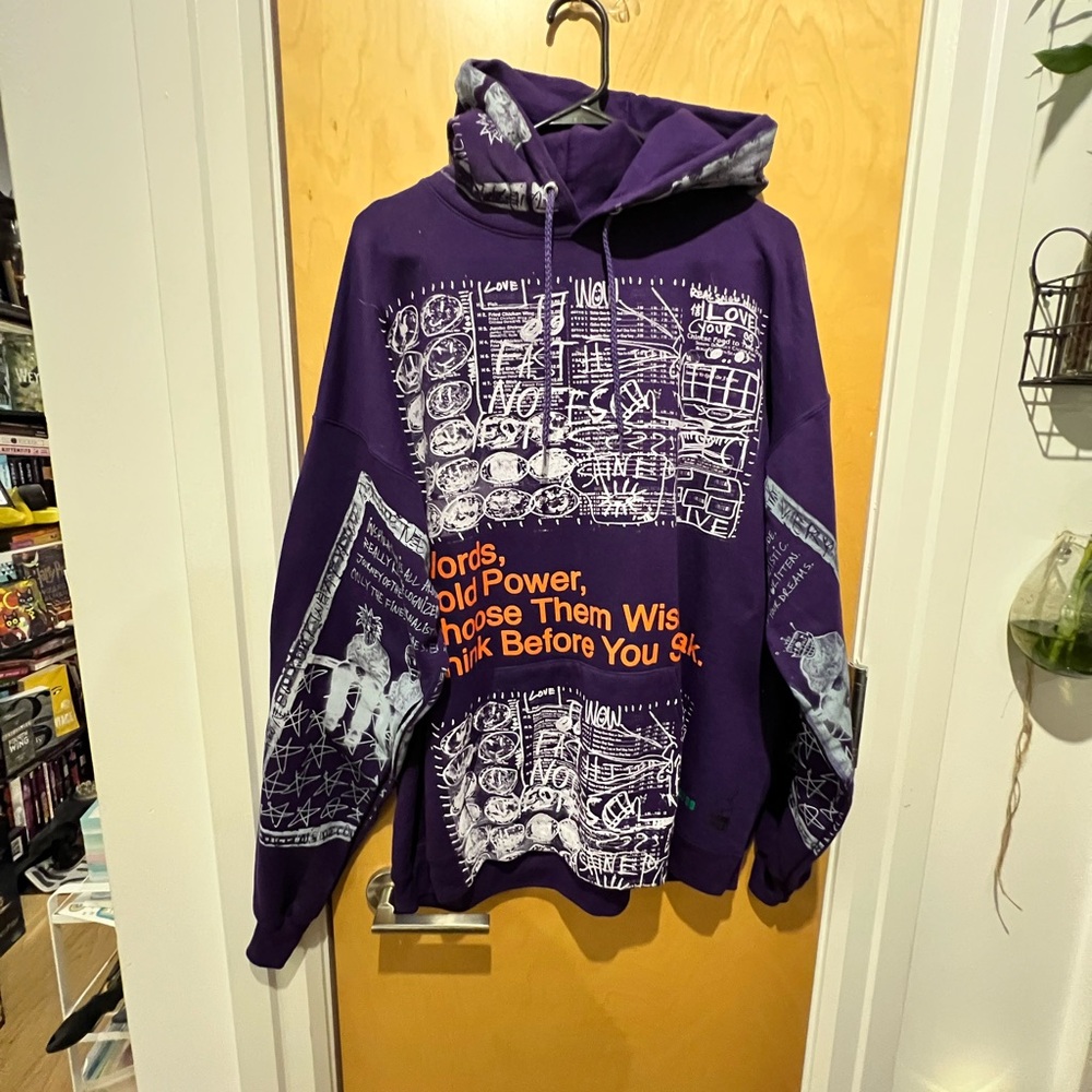 NWOT Snow Milk Purple Graphic Hoodie with White and Orange Accents